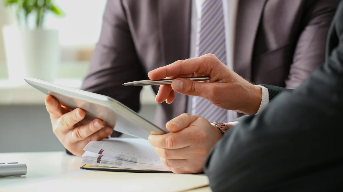 Two businessmen talking